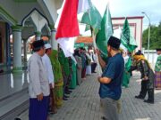 Kades Pebatan Pimpin Kirab Bendera Merah Putih Sambut Harlah NU di Wanasari